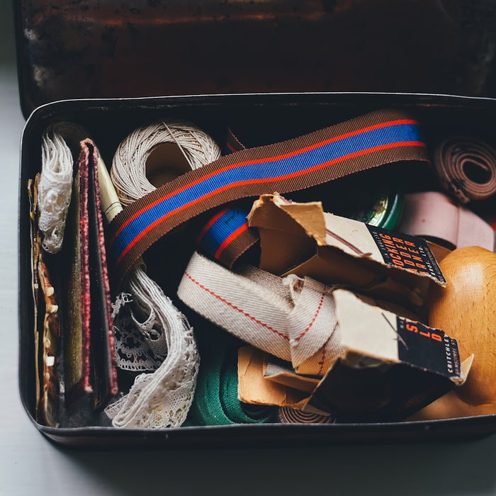 assorted belts and packs on metal case