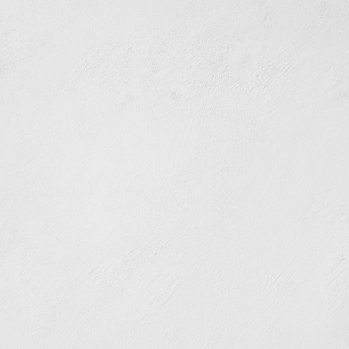 a man riding a snowboard down a snow covered slope