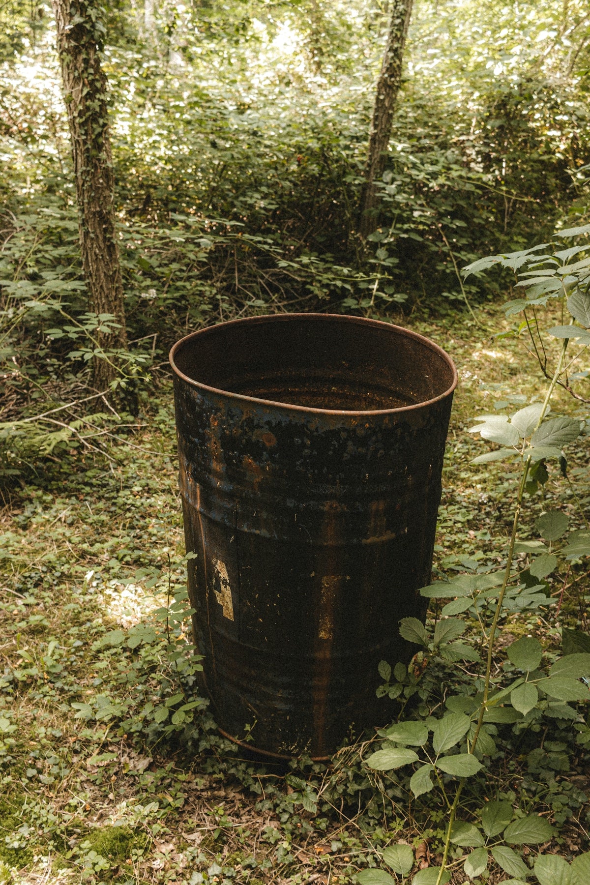 brown wooden round container on ground