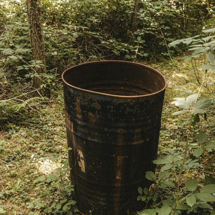 brown wooden round container on ground