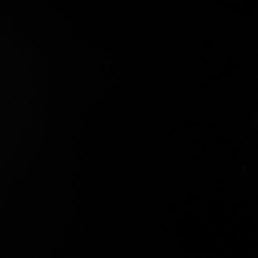 a black and white photo of a man's face