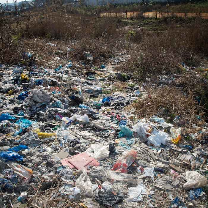 a dump site with trash