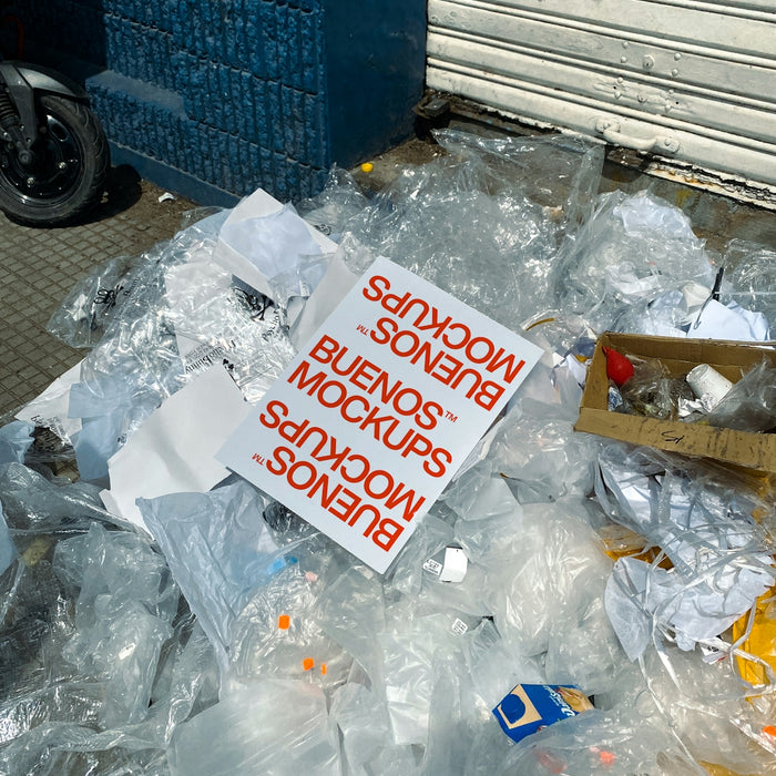 a pile of plastic bags with a sign on it