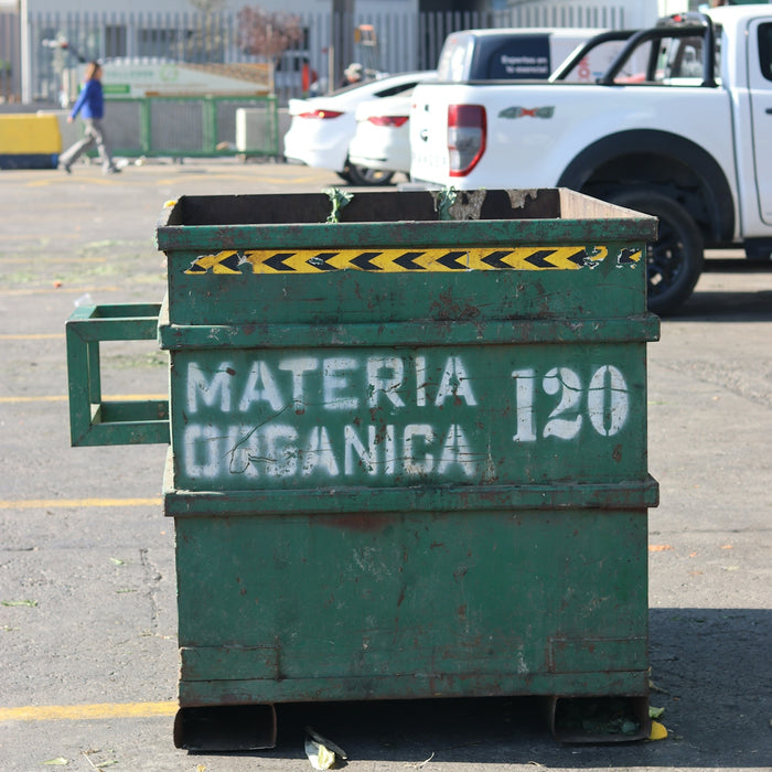 An organic waste bin is shown outside.